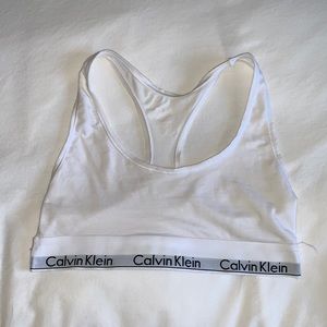 Calvin Klein bra size small. Minor discoloration shown in photo.